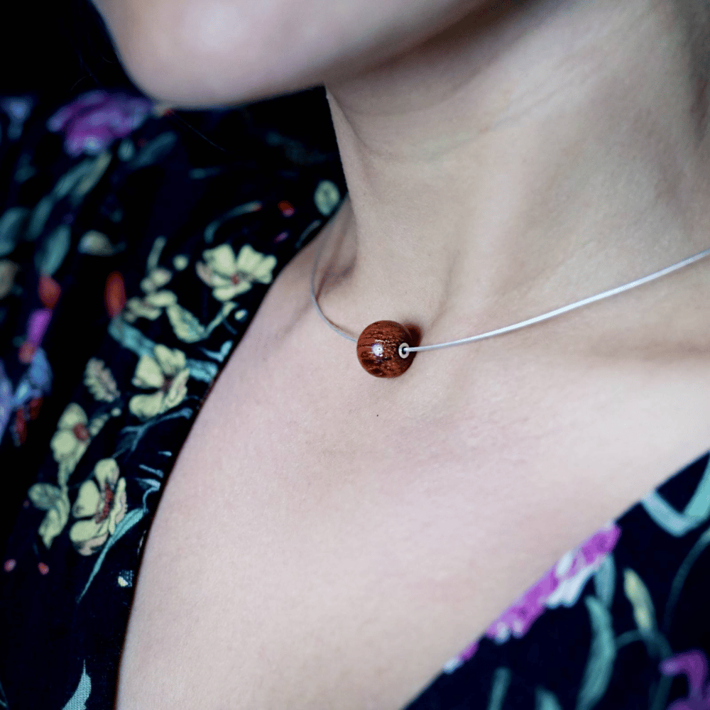 delicate wood and silver necklace and jewellery collection