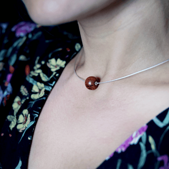 delicate wood and silver necklace and jewellery collection