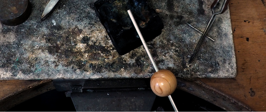 handmaking silverwood jewellery on the bench