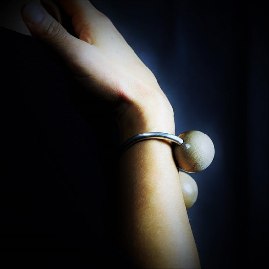 Load image into Gallery viewer, Gaia Double Sphere Torque Bangle - Silverwood Jewellery
