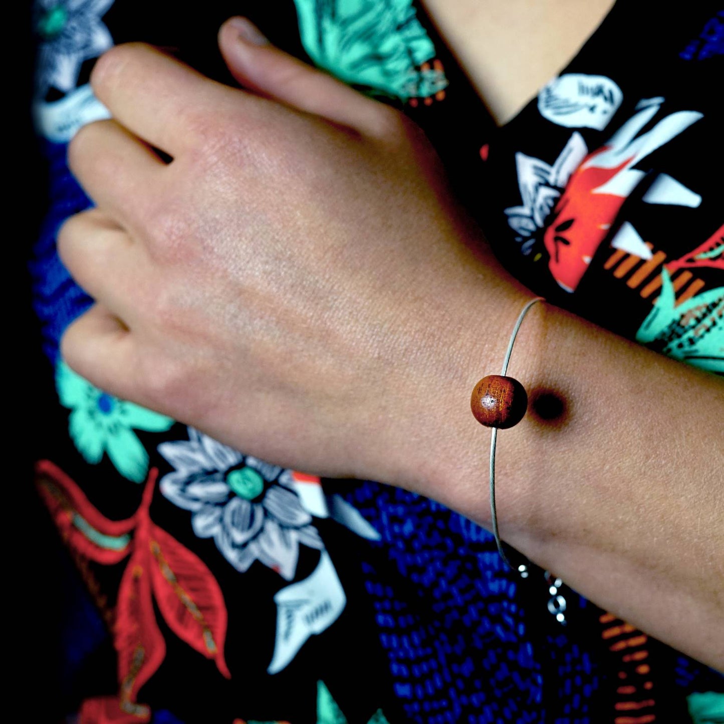 Lana Red Wood Bead on Silver Cable Bracelet worn on arm Unisex jewellery, vegan range by Silverwood Jewellery