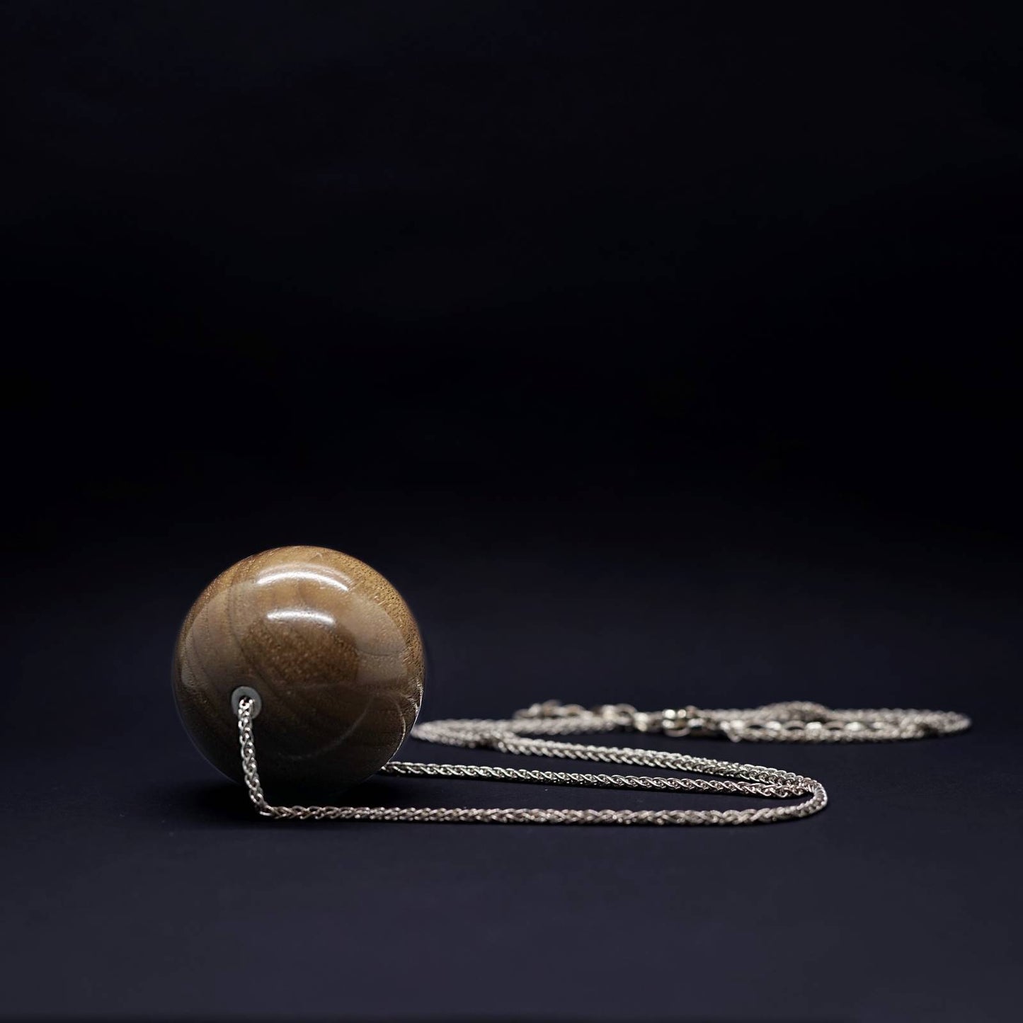 Load image into Gallery viewer, Gaia Giant 50mm wood Bead Pendant with silver detail on Long sterling silver  chain for this vegan necklace by Silverwood Jewellery
